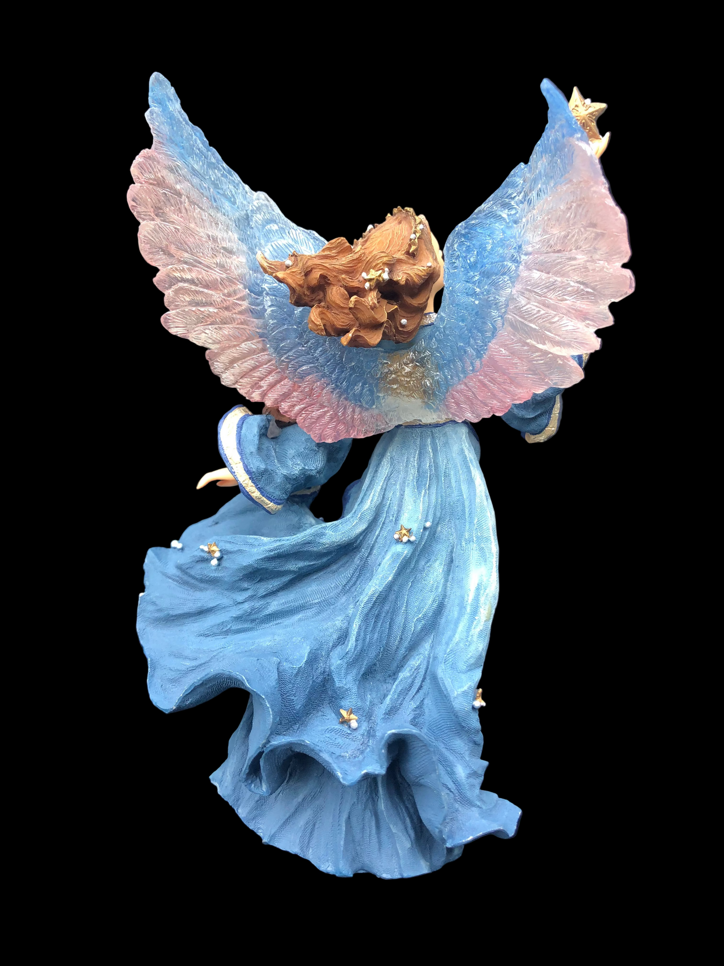 Decorative angel figurine with colorful wings and flowing robes