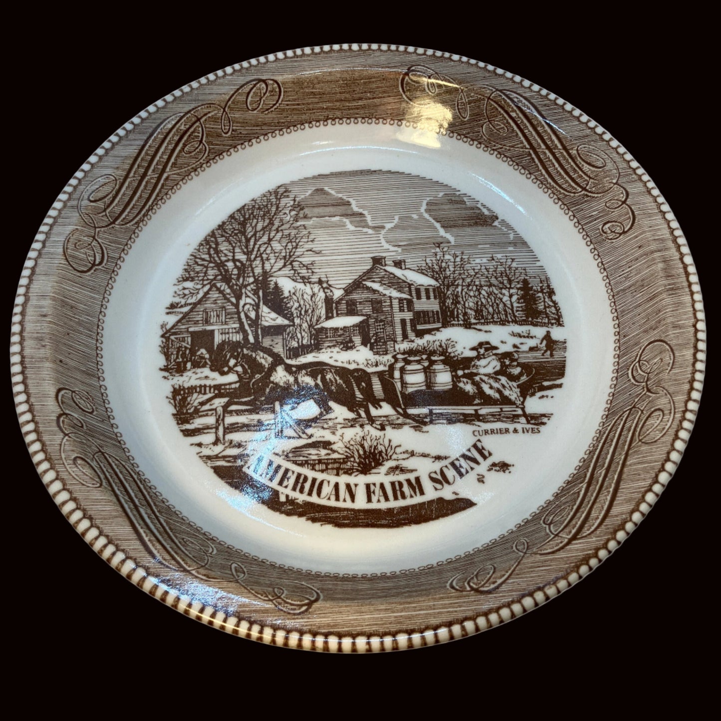 Mid century ceramic pie plate with farm scene