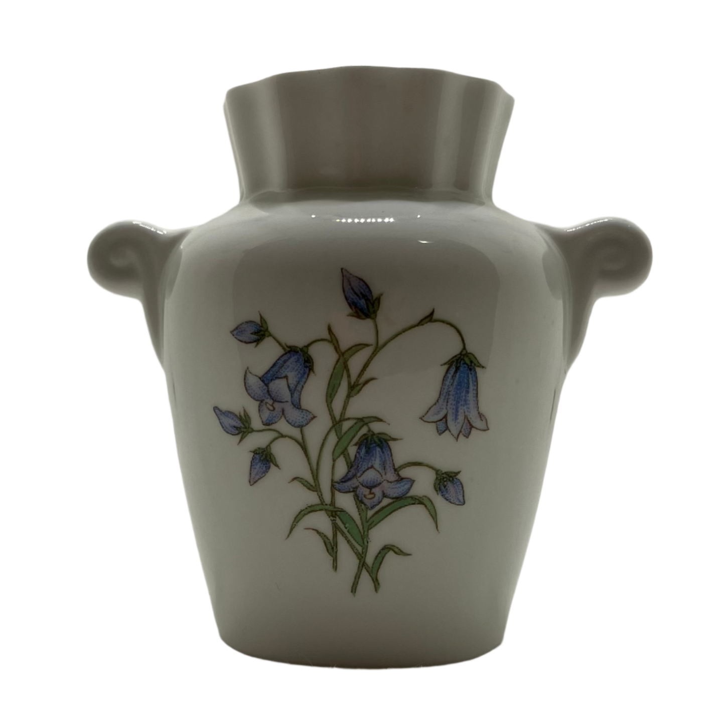 Miniature small white vase with bluebell design on a plain background