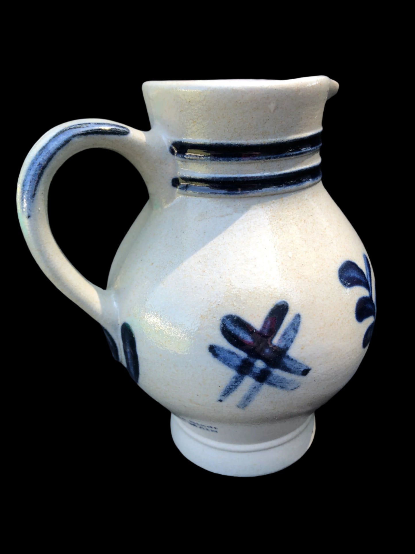Salt glazed German pitcher perfect for rustic farmhouse decor with its grey and cobalt design
