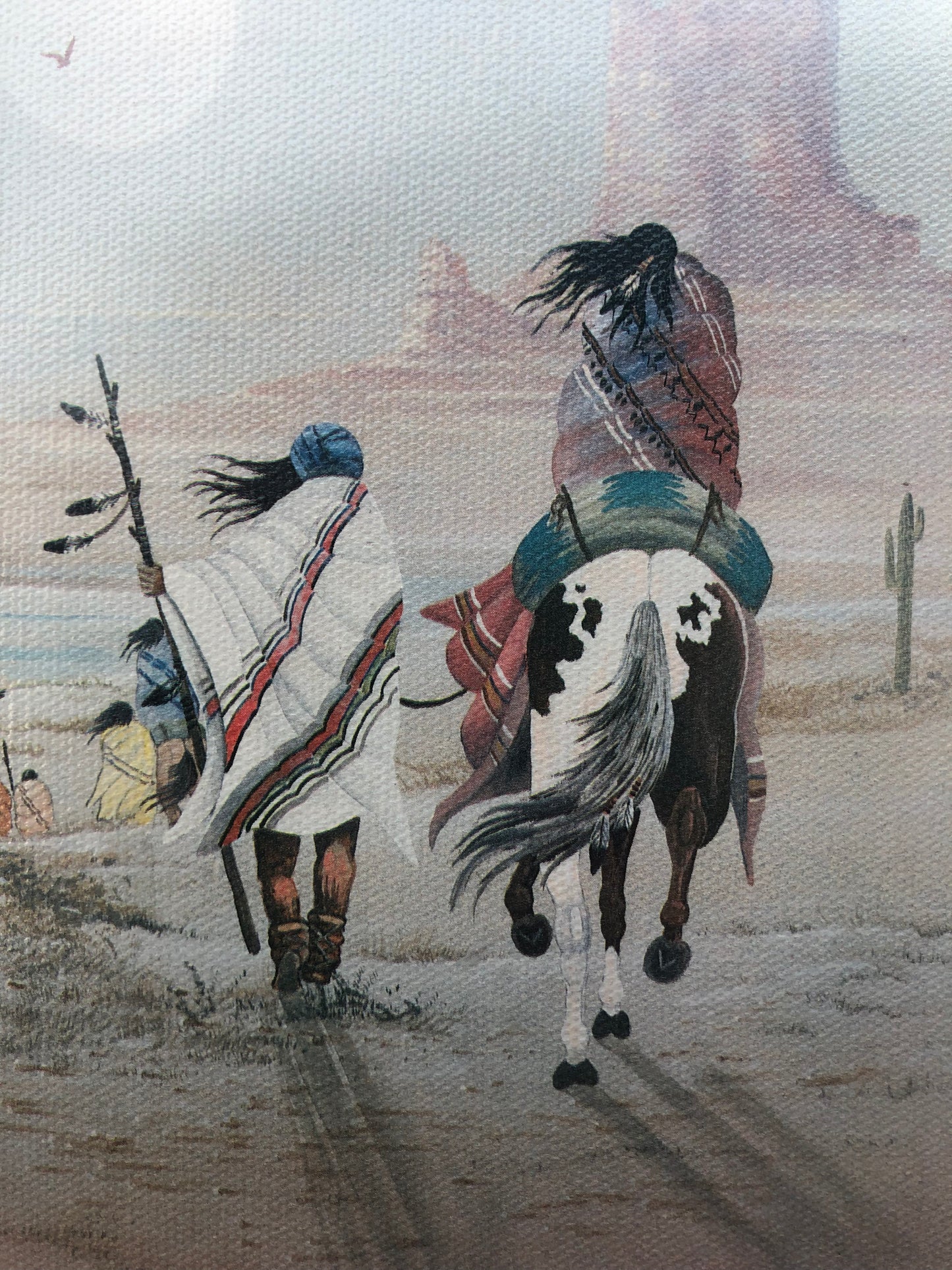 Vintage art of Depicts a couple traveling, one on horseback and one on foot