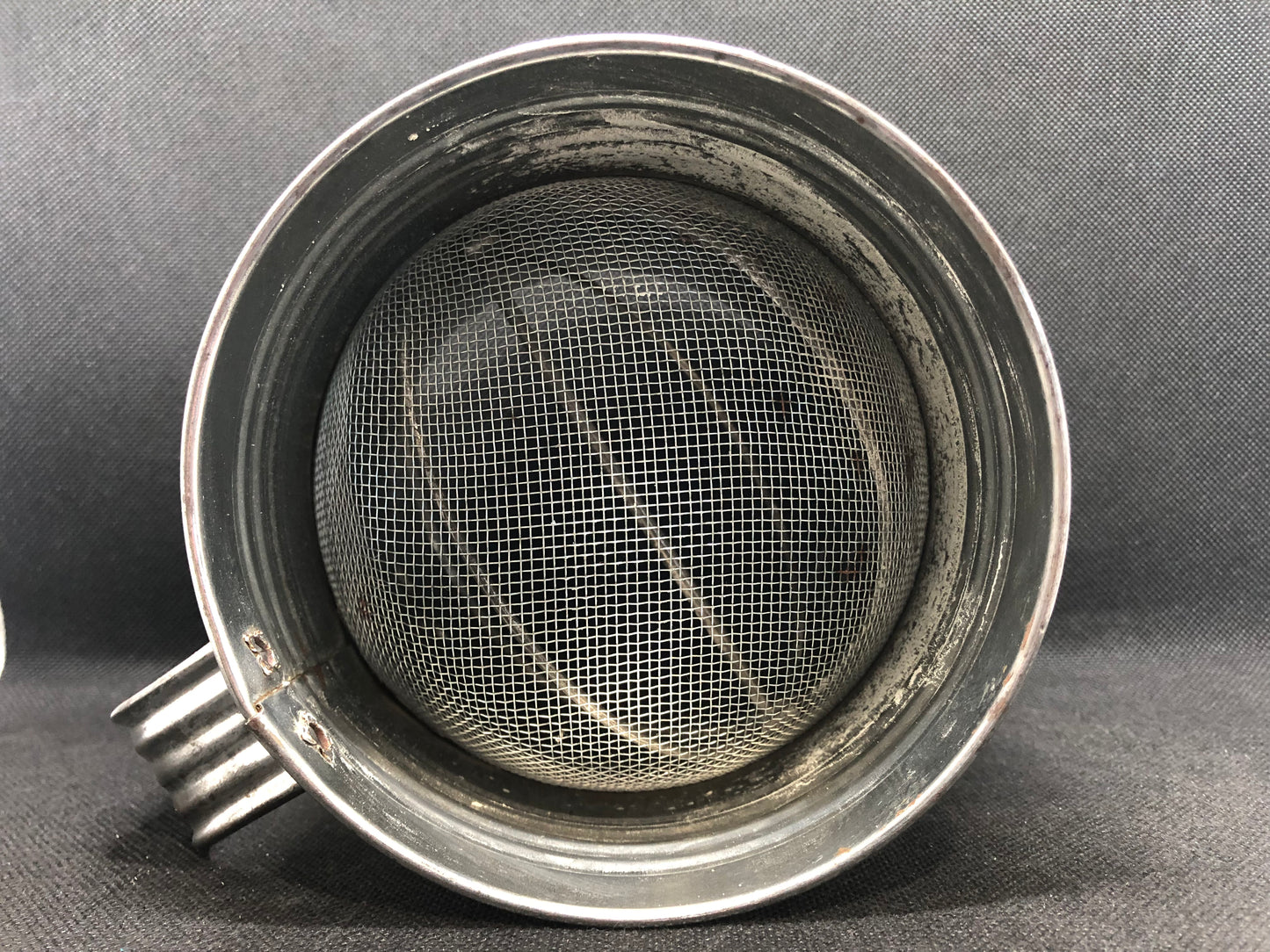 Vintage flour sifter interior