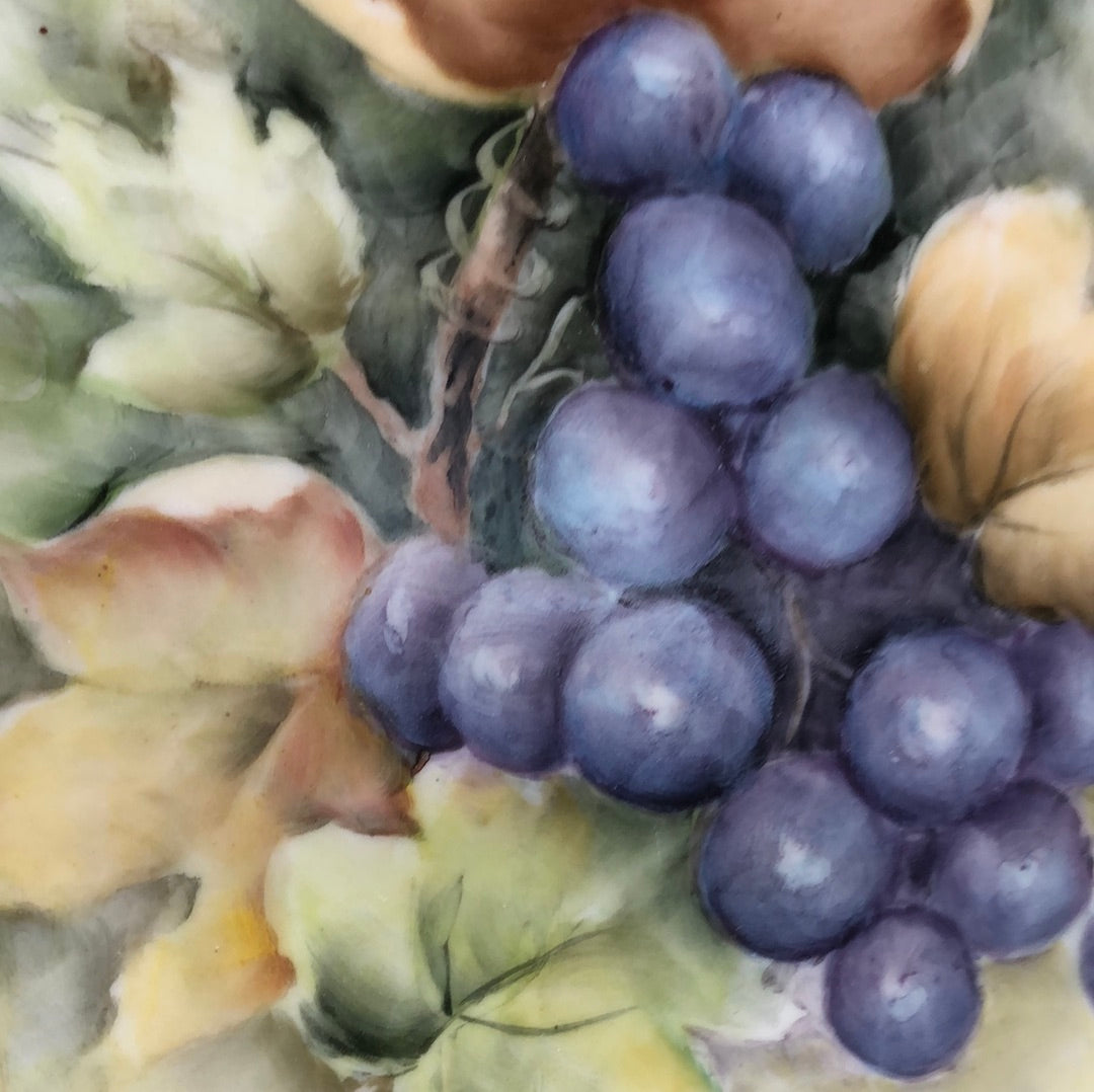 porcelain plate hand painted grapes close up
