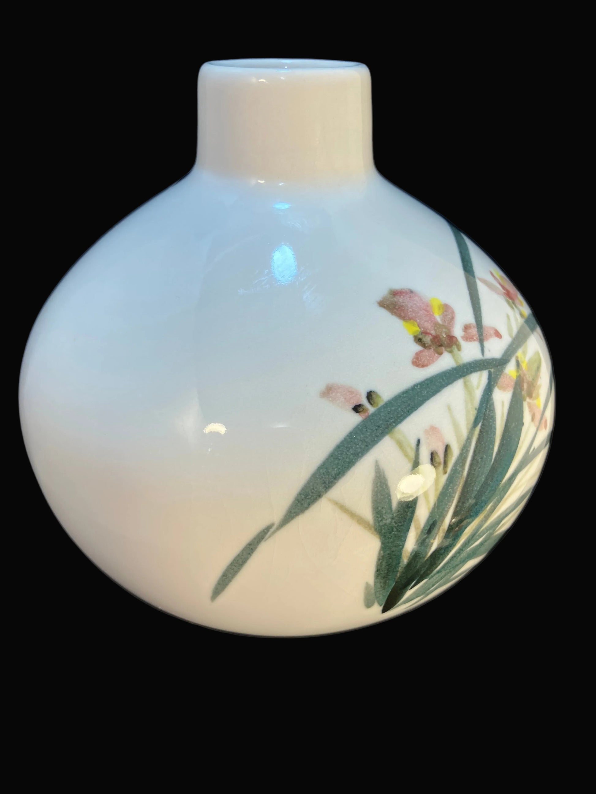 round ceramic vase with watercolor style floral design