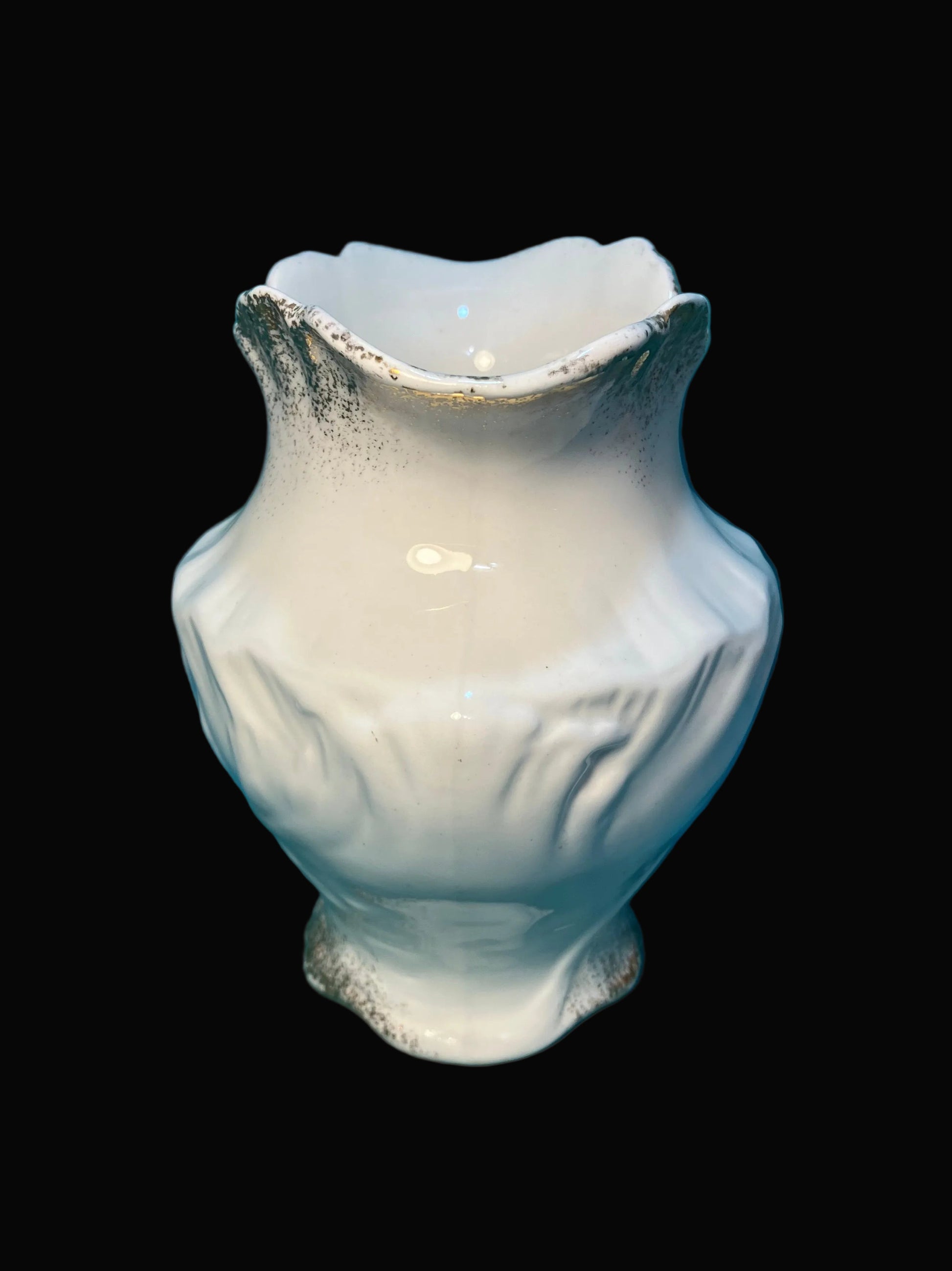 White and gold John Haddock toothbrush holder from 1900