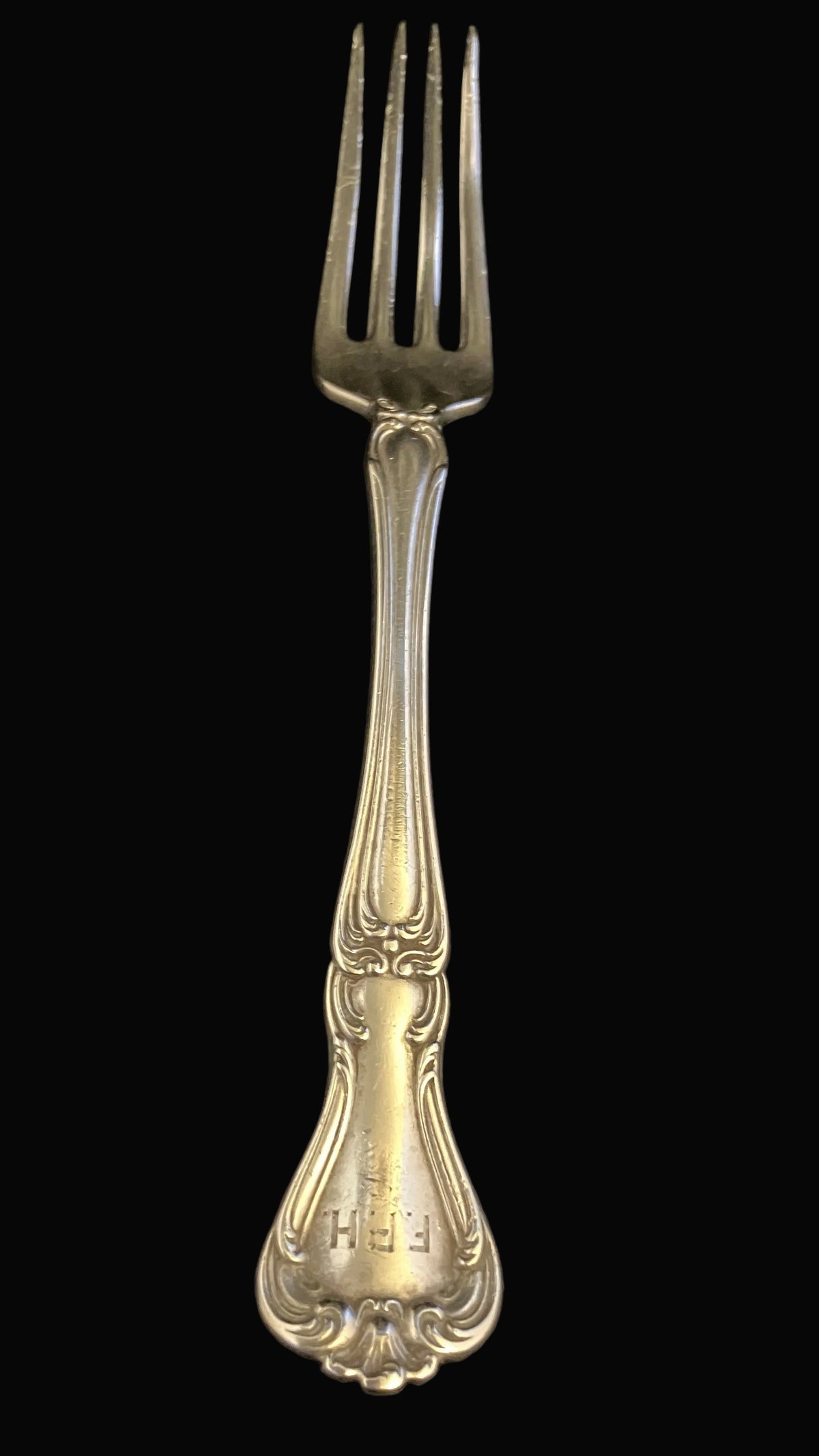 Gorham Buckingham youth fork, crafted in genuine sterling silver. The fork is marked with the classic Gorham lion, anchor, and G symbols, along with Pat. 1910
