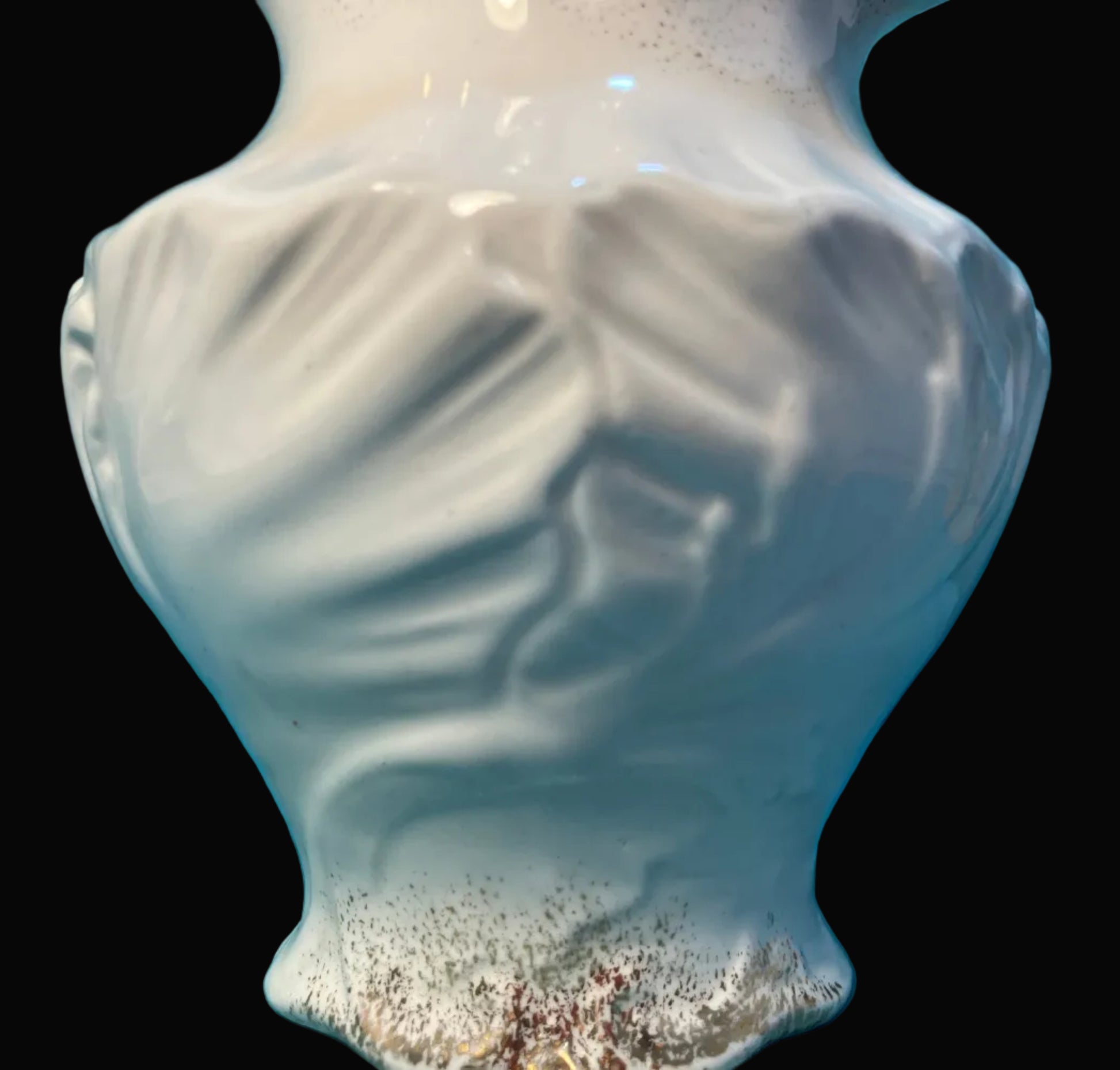White ceramic vase with textured surface