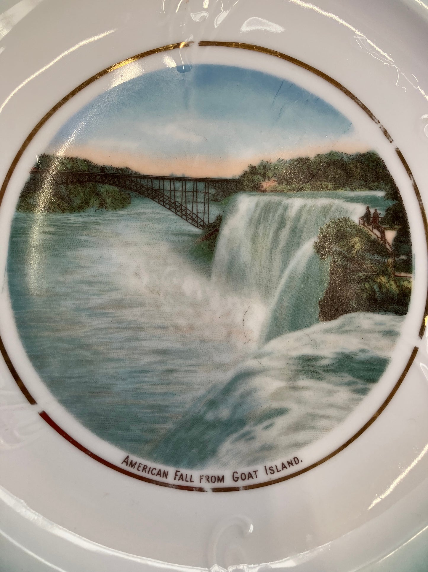 Decorative plate with a scenic depiction of American Falls from Goat Island.