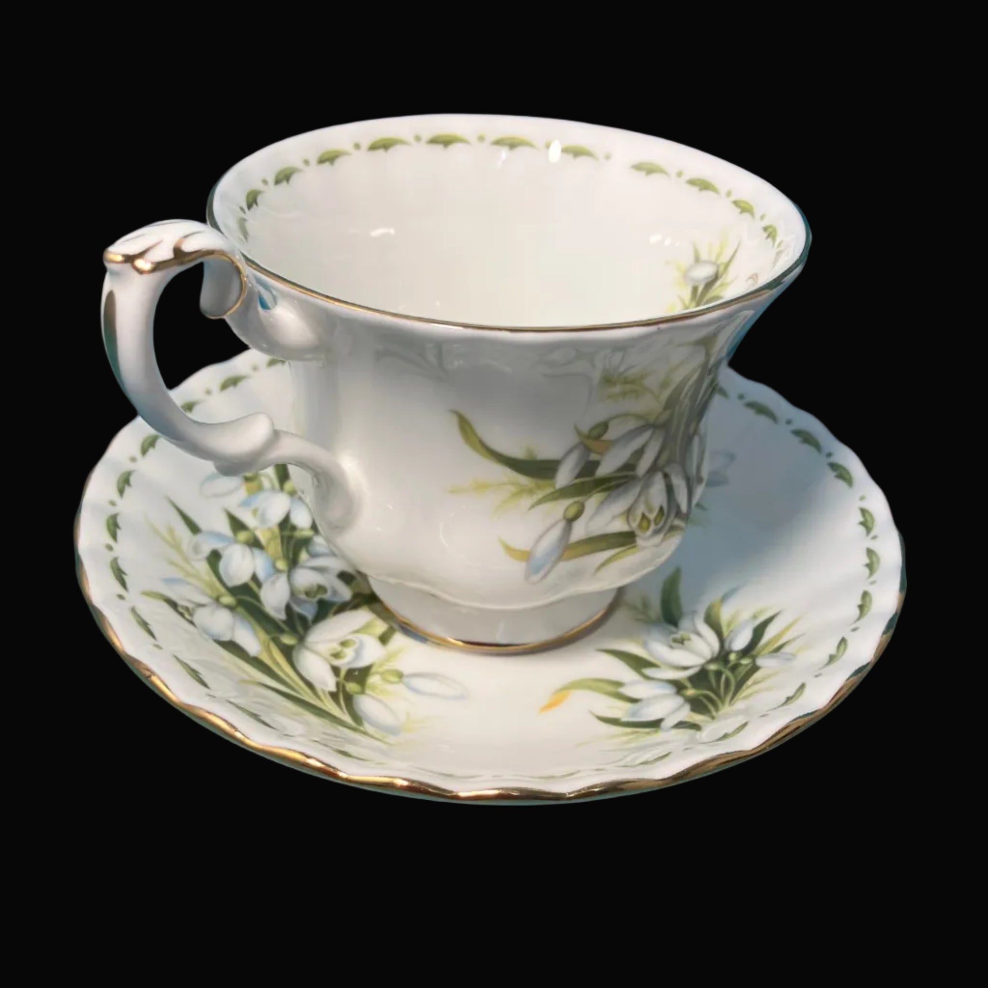 Teacup and saucer with floral design 