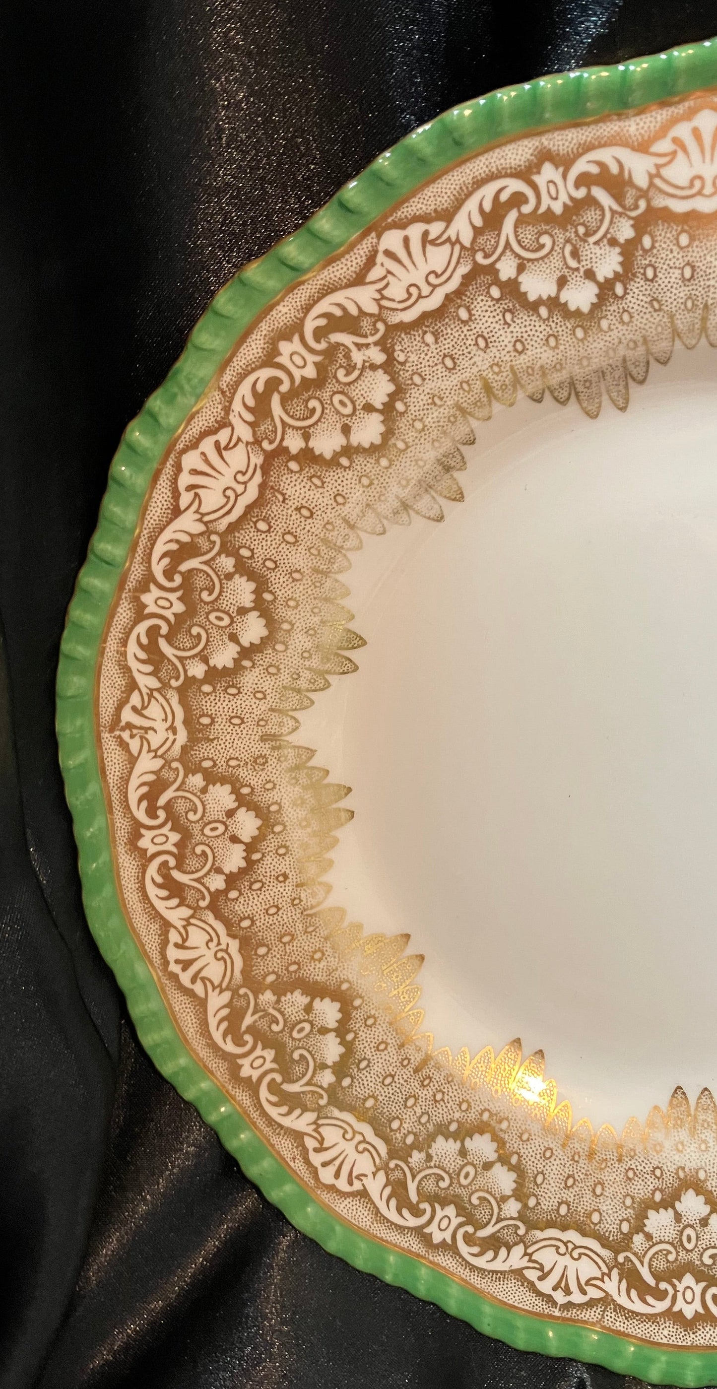 Decorative plate with intricate patterns on a black background