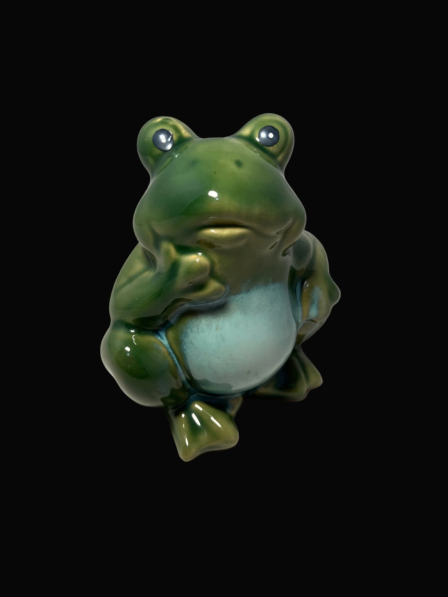 vintage frog figurine in a thinking pose