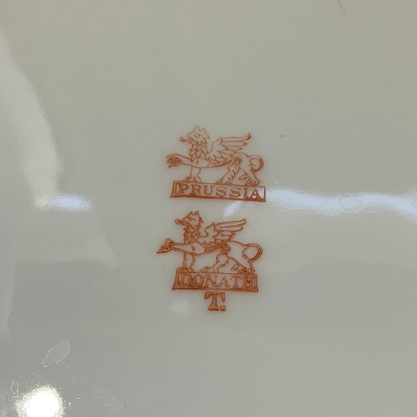Antique Donath Prussia Cake with a red griffin back stamp