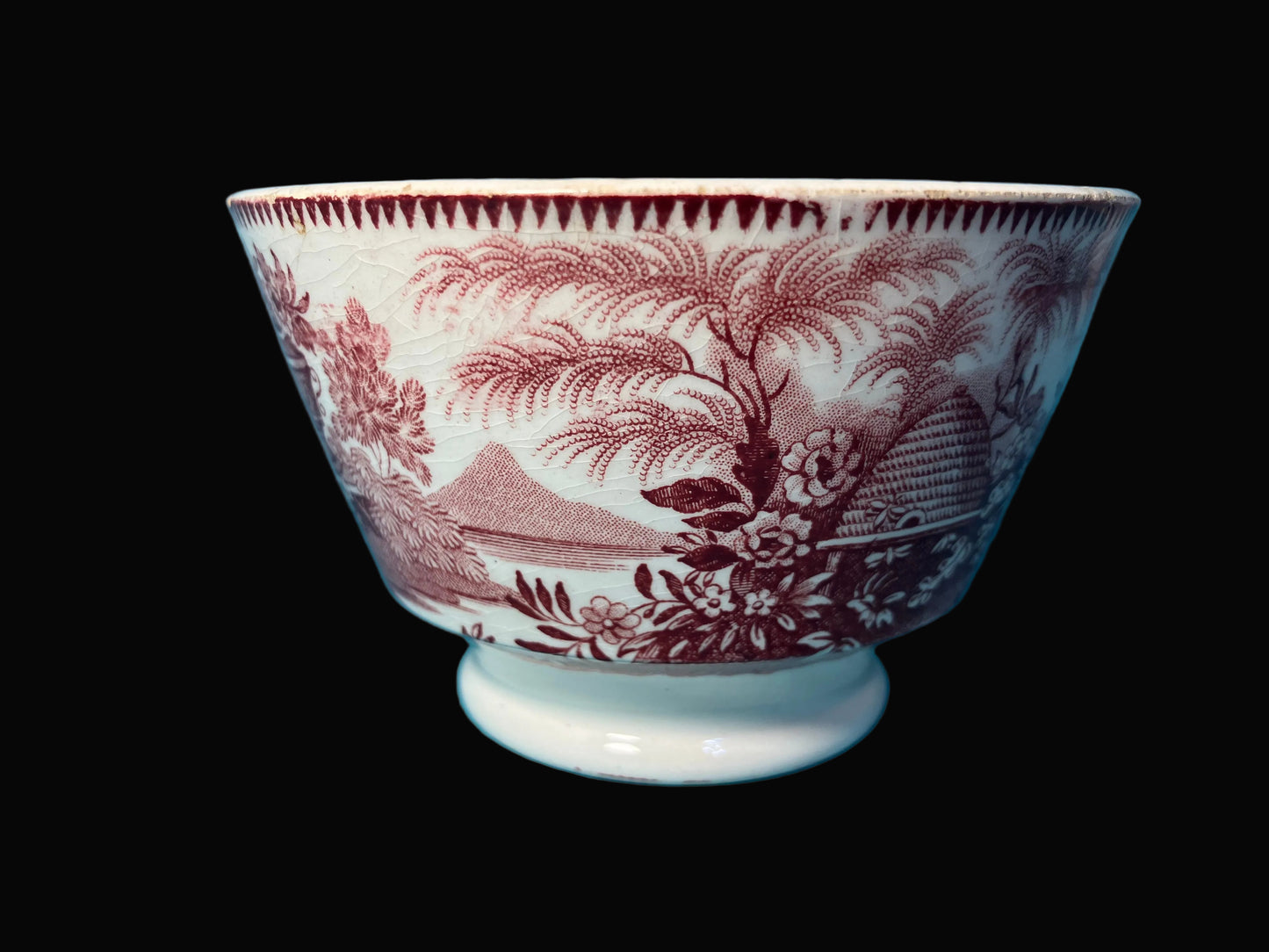 Antique red transferware handless cup with beehive design