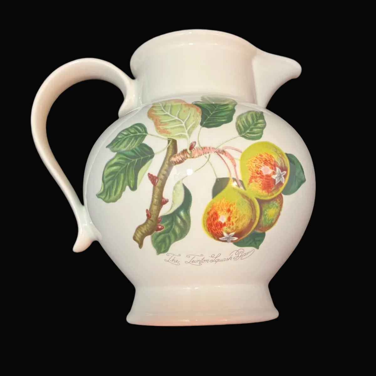 A white ceramic pitcher decorated with a hand-painted branch featuring green leaves and three yellow-orange pears.