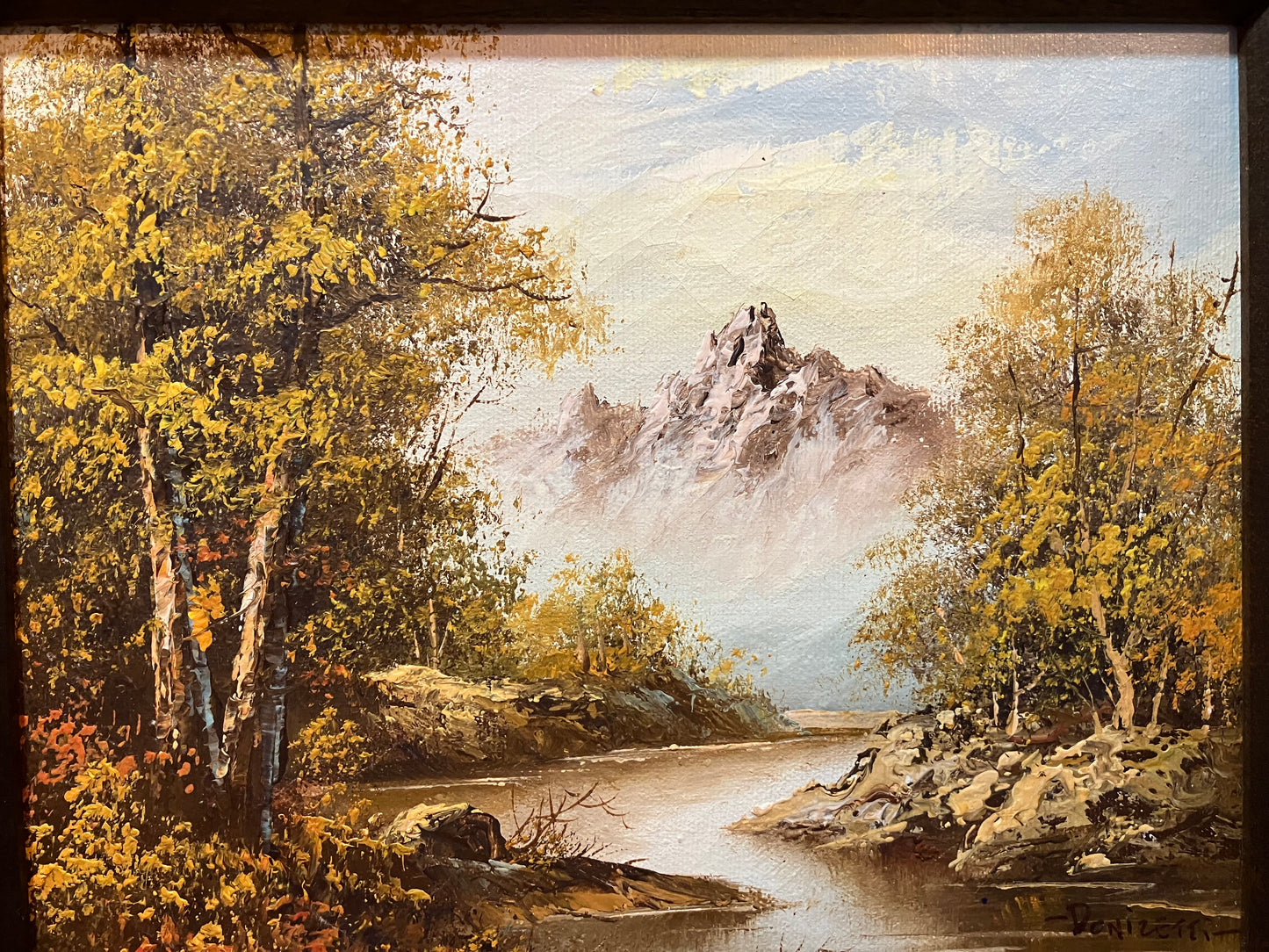Painting of a mountain landscape with trees and a river