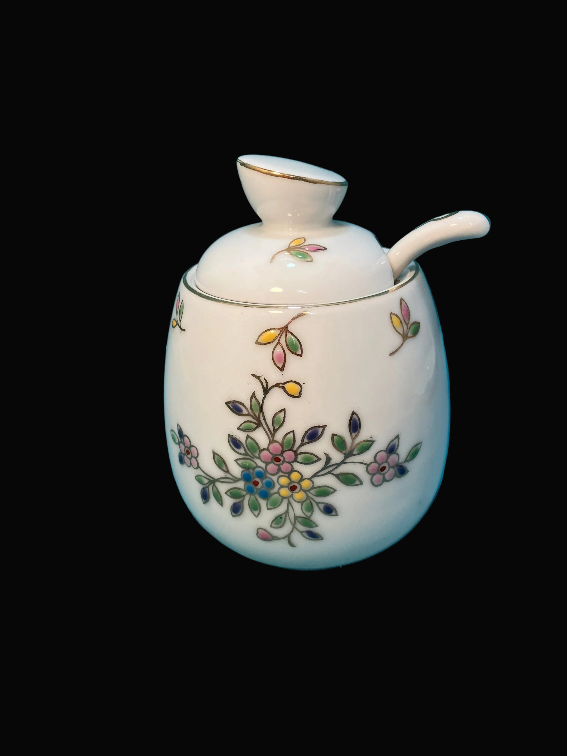Small ceramic jar with floral design 