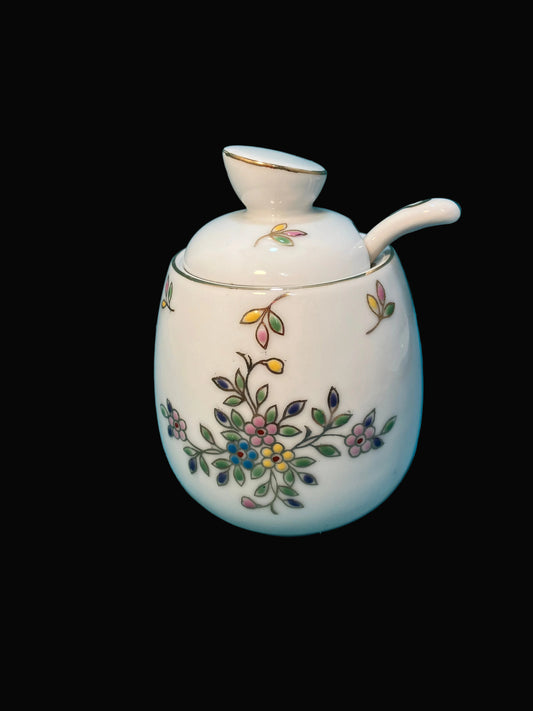 Small ceramic jar with floral design 