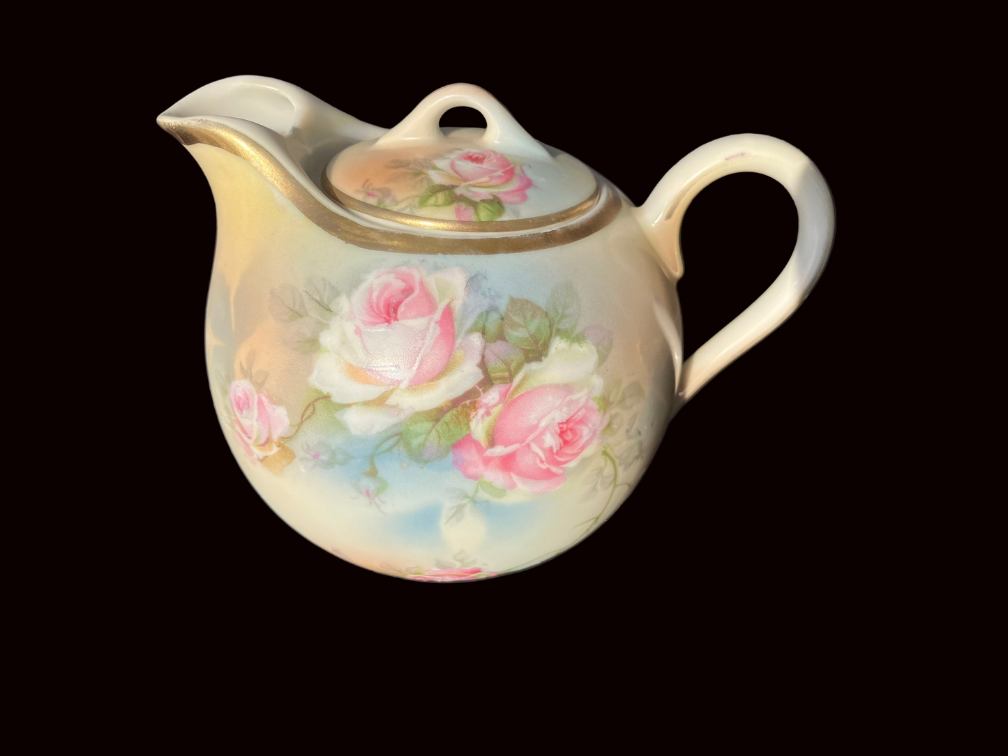 Bavarian lidded creamer with pastel roses which were hand painted 