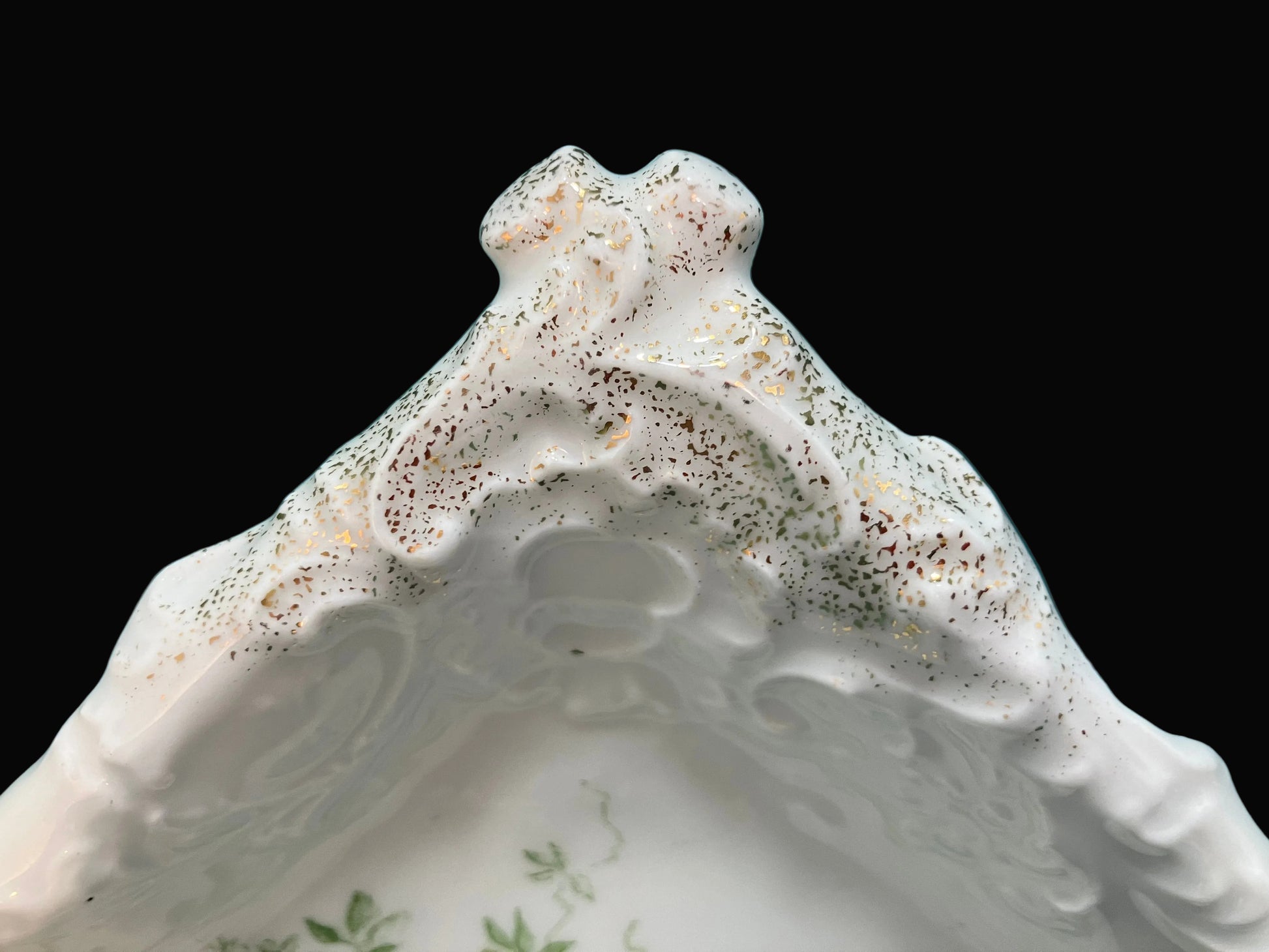 Close-up of a decorative ceramic dish with intricate patterns 
