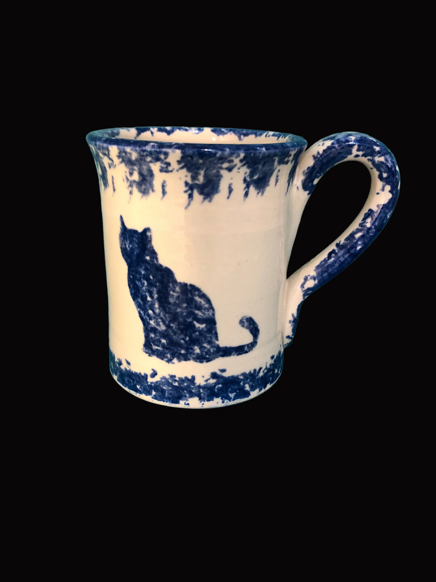 Ceramic mug with blue cat design