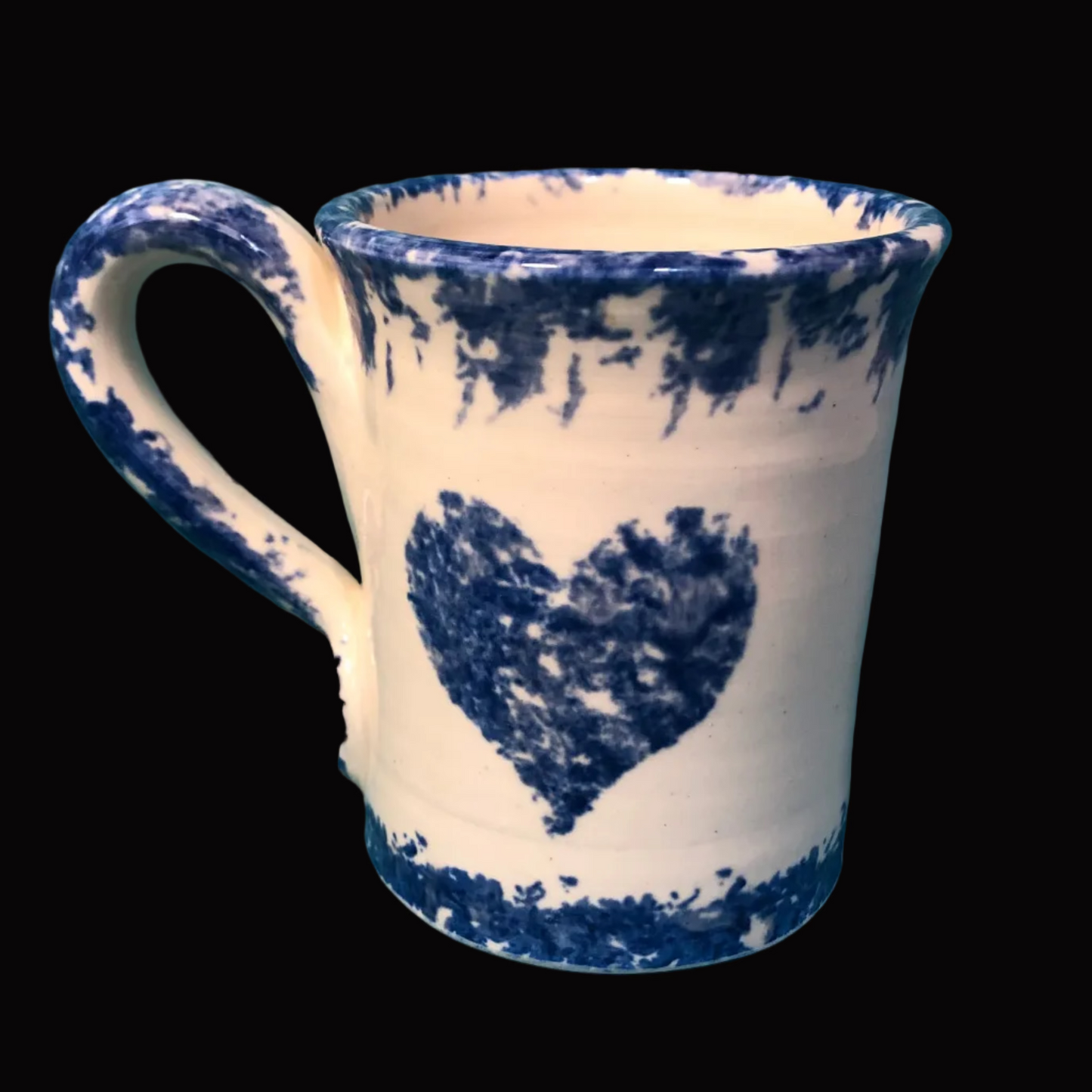 Ceramic mug with blue heart design on one side and cat on the other