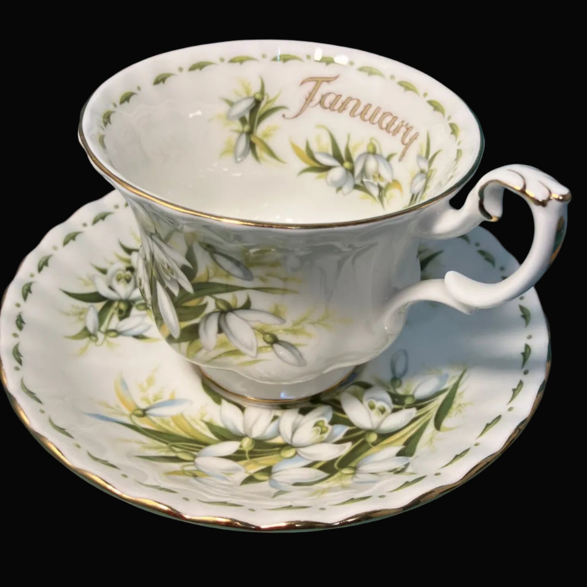 Teacup and saucer with floral design 