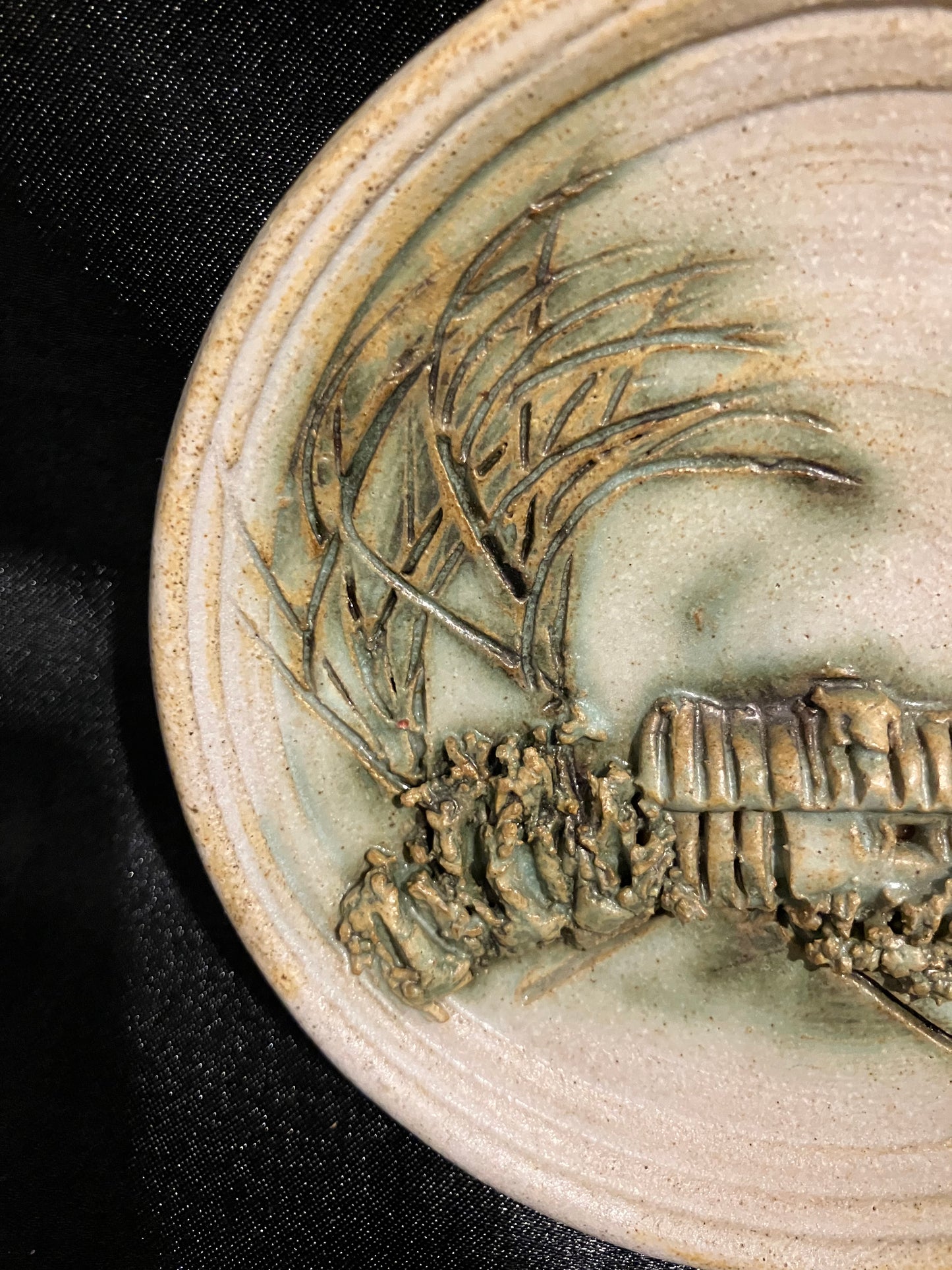 vintage handcrafted pottery wall plaque features a peaceful cottage scene
