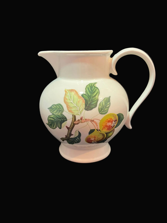 A vintage Portmeirion Pomona ceramic pitcher decorated with a botanical illustration of leaves and squash pear