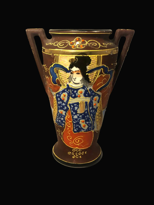 Decorative vase with artistic design on a black background