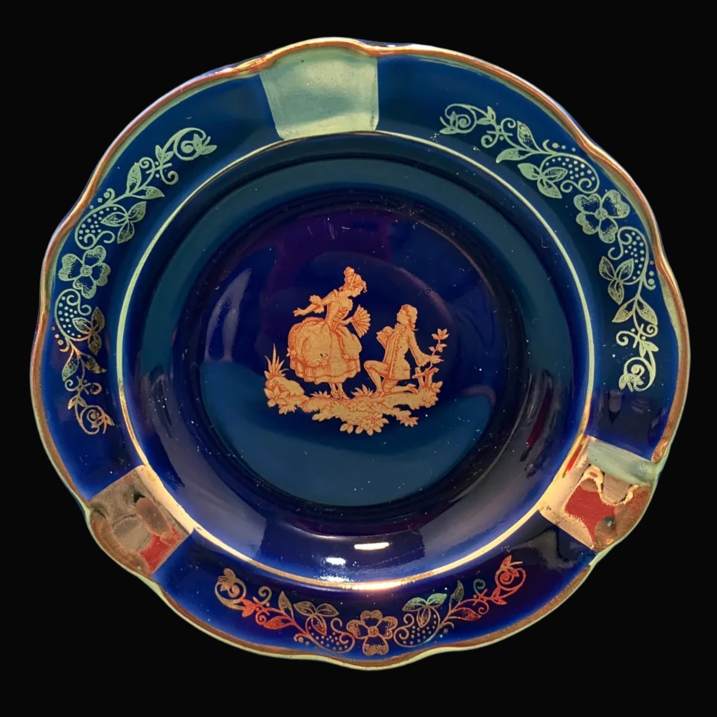 Decorative blue ceramic trinket dish/ash tray with gold embossed design background