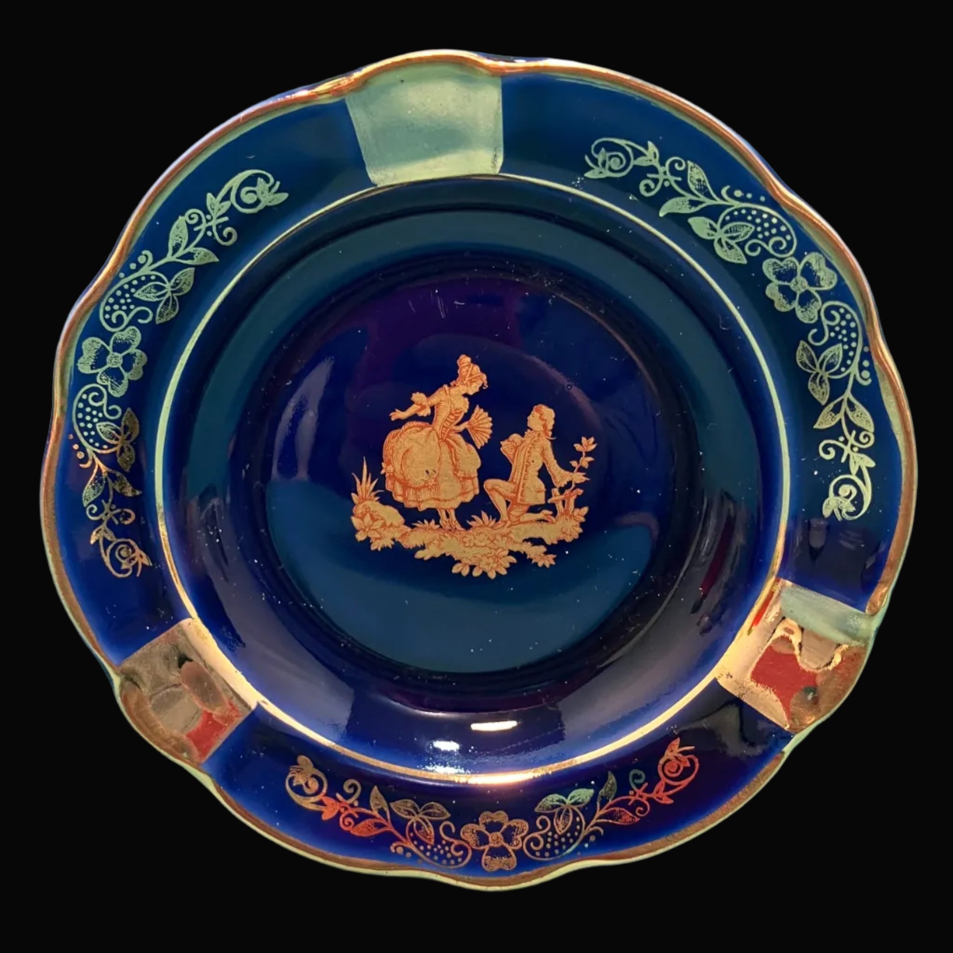 Decorative blue ceramic trinket dish/ash tray with gold embossed design background