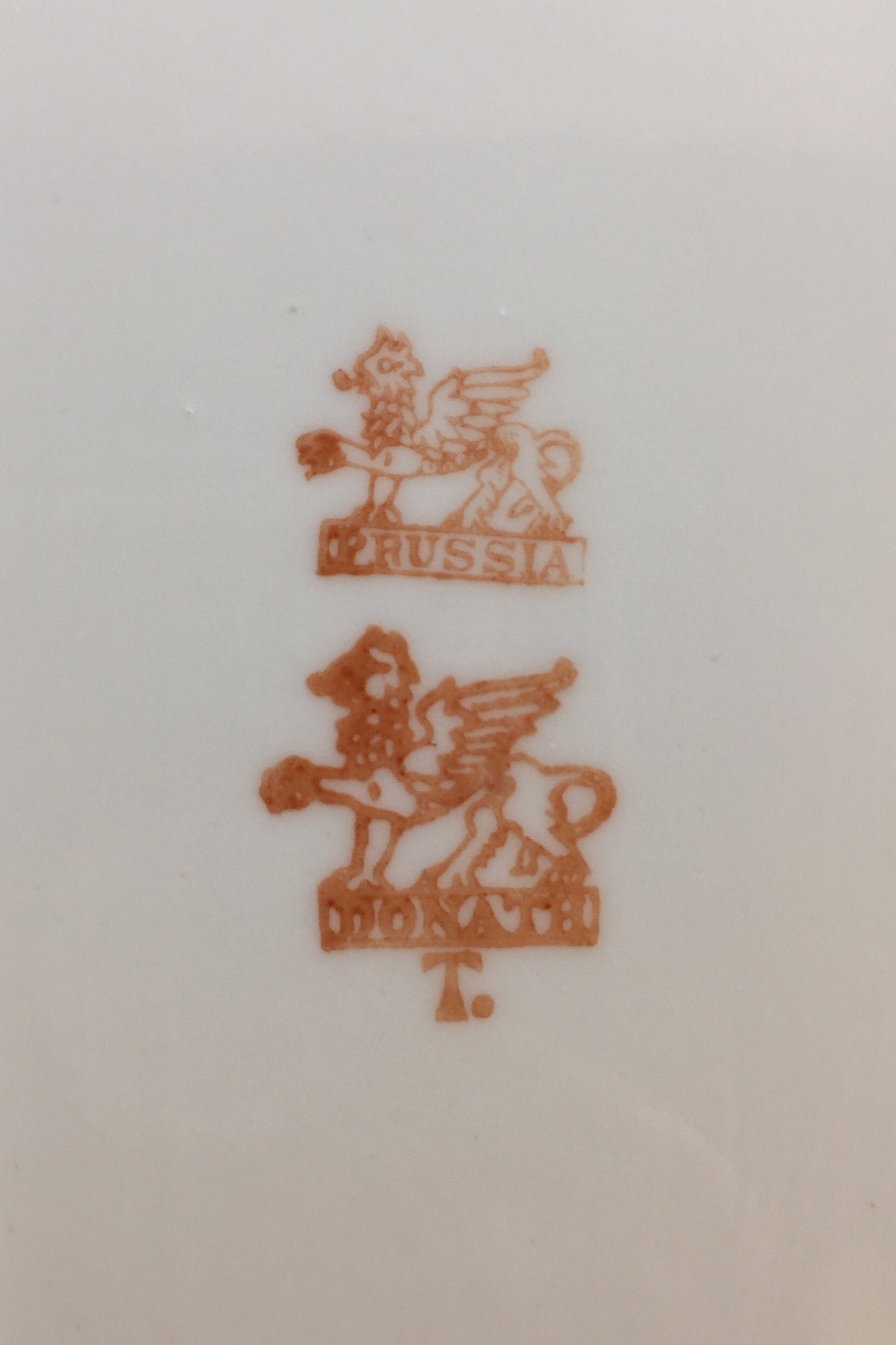 Marked Prussia and Donath with a red griffin back stamp