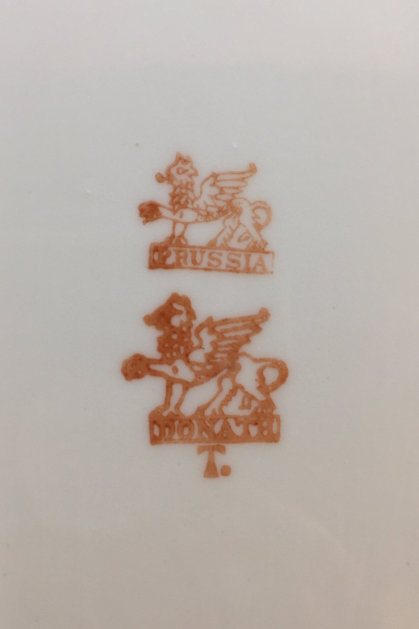 Marked Prussia and Donath with a red griffin back stamp