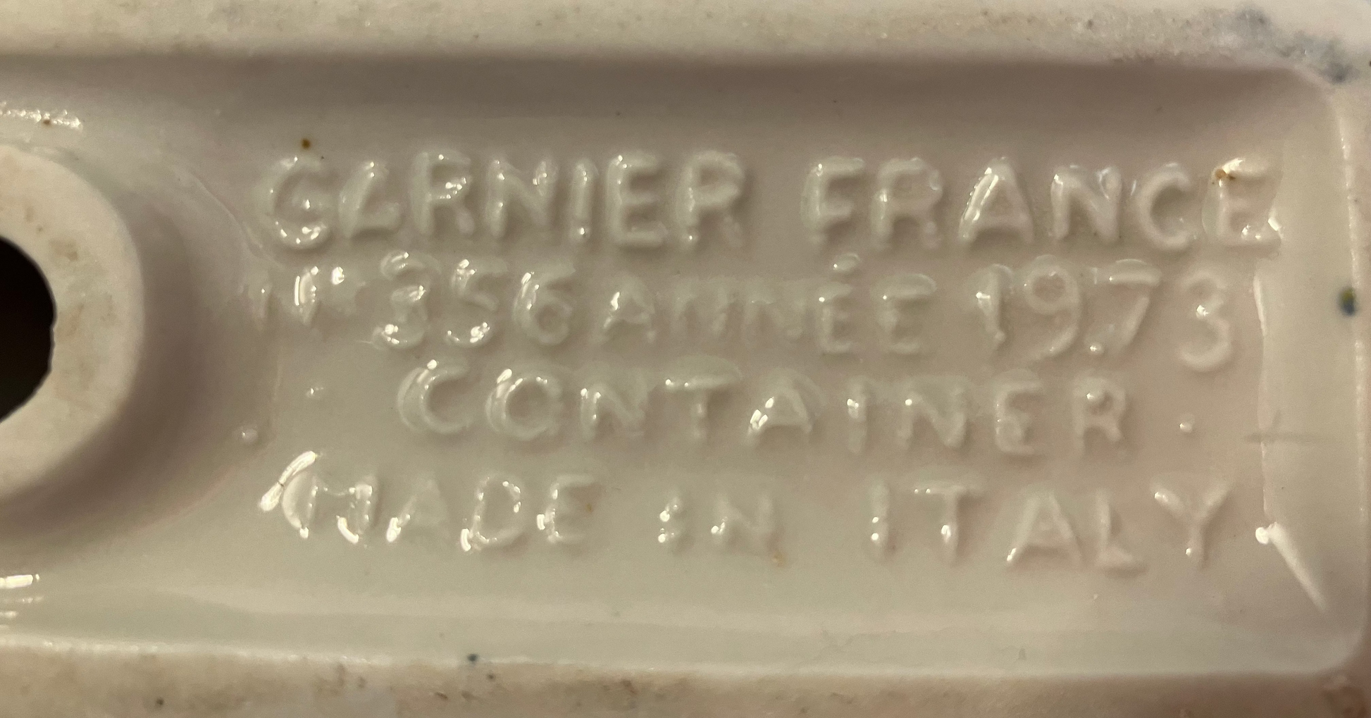 Porcelain container with 'Garnier France' and 'Made in Italy' text on a white background