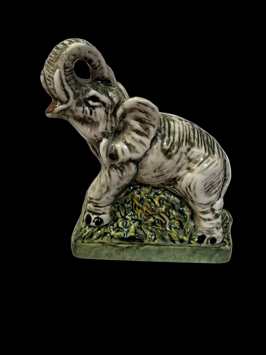 Small ceramic elephant figurine 