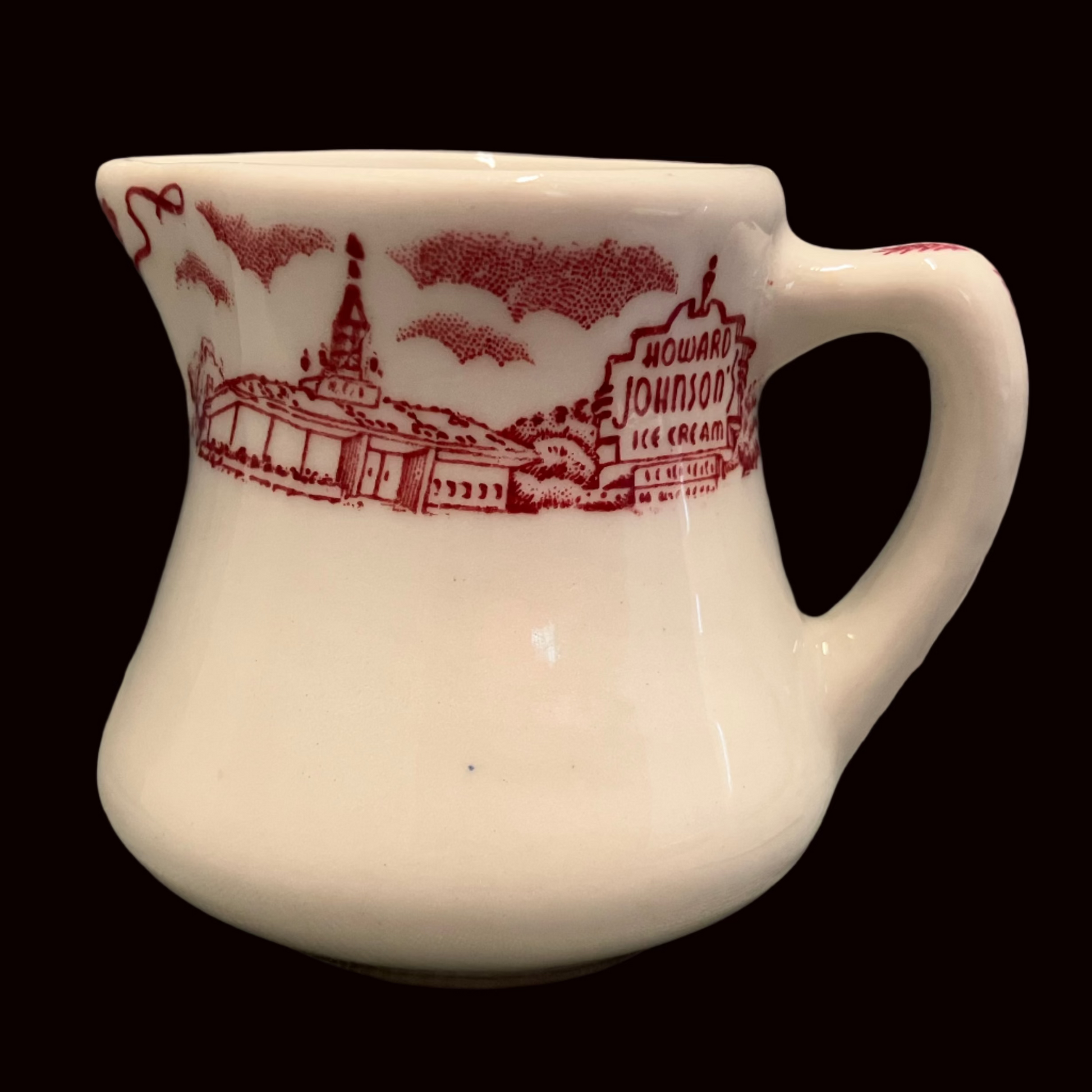 Vintage small creamer made by Caribe China for Howard Johnsons 