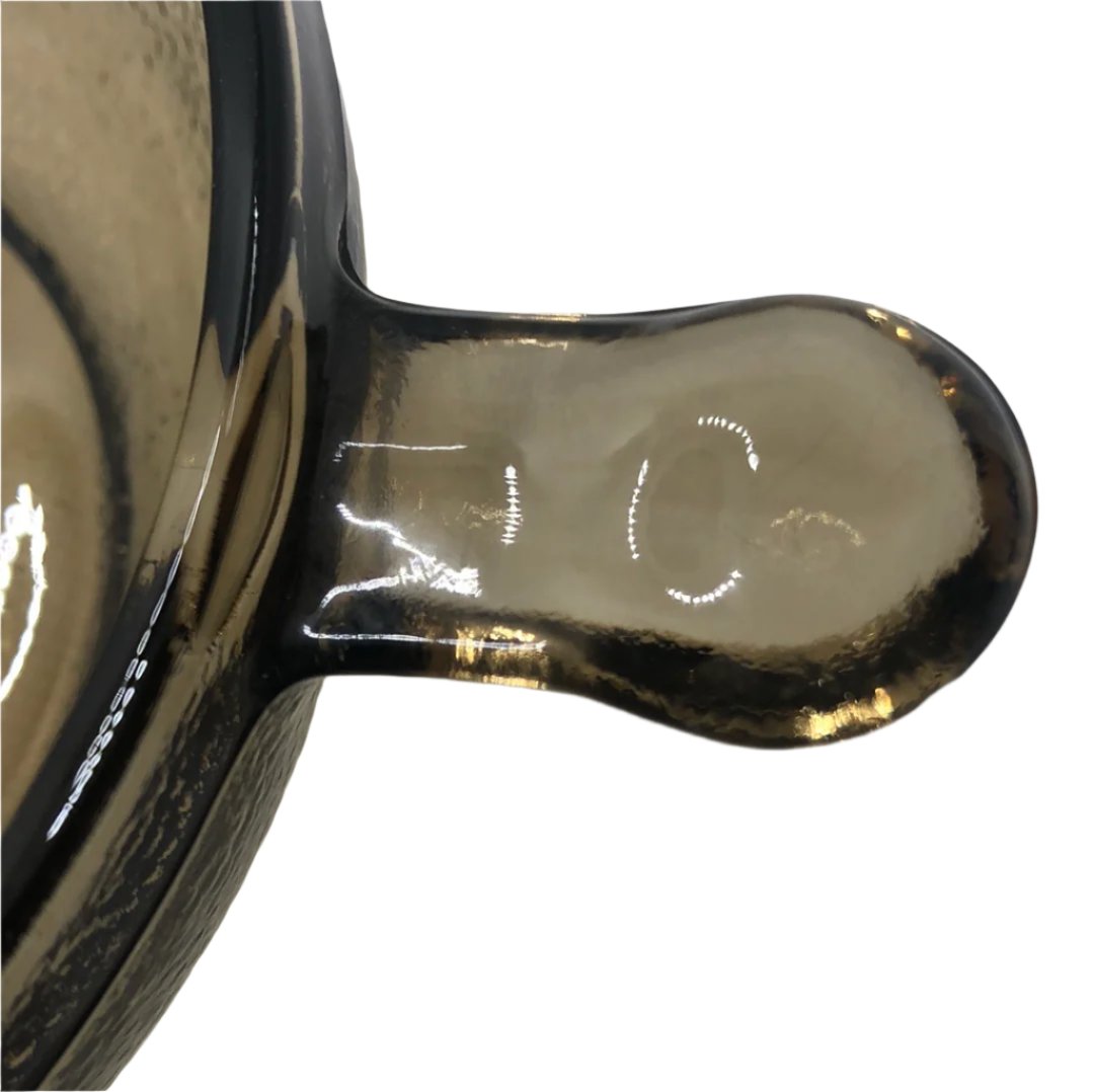 soup bowl handle smoky textured glass close up